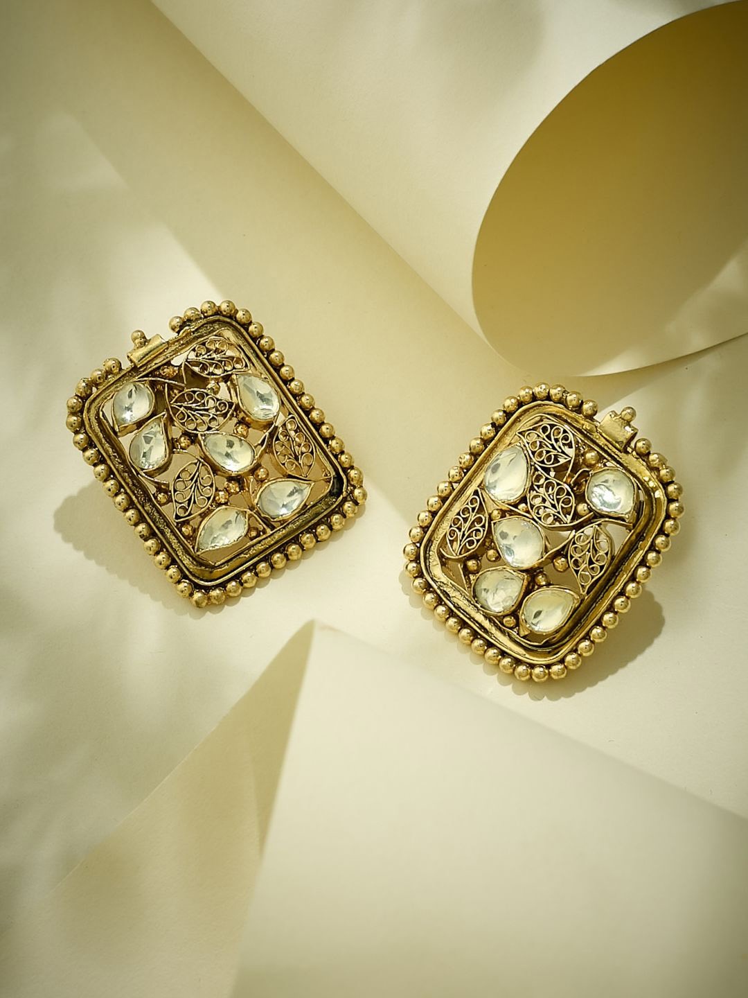 

Yinara Elegant Gold-Plated Kundan Stone Studded & Pearls Beaded Square Leaf Design Studs