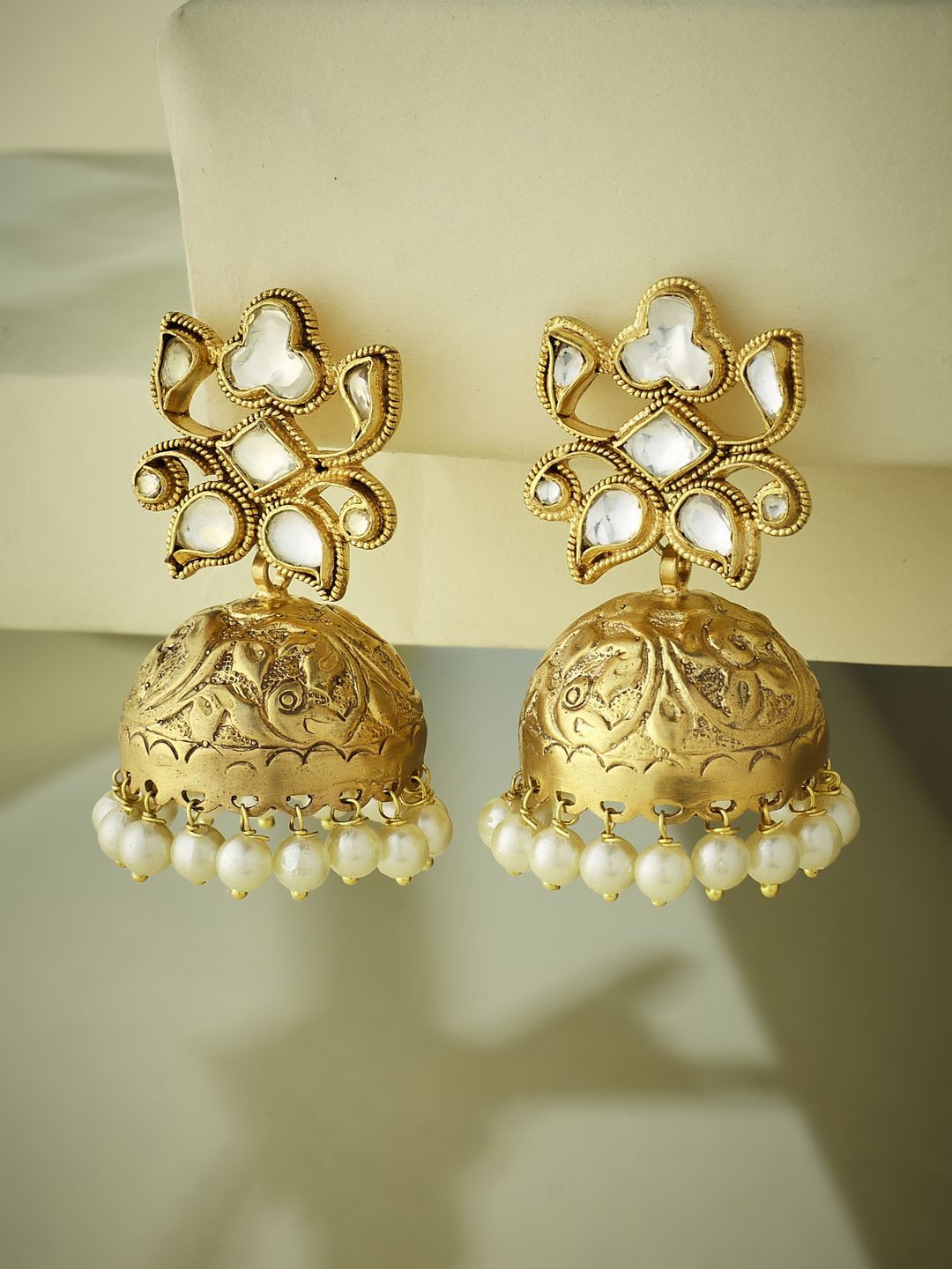 

Yinara Elegant Gold-Plated Kundan Stone Studded Dome Shaped Jhumkas