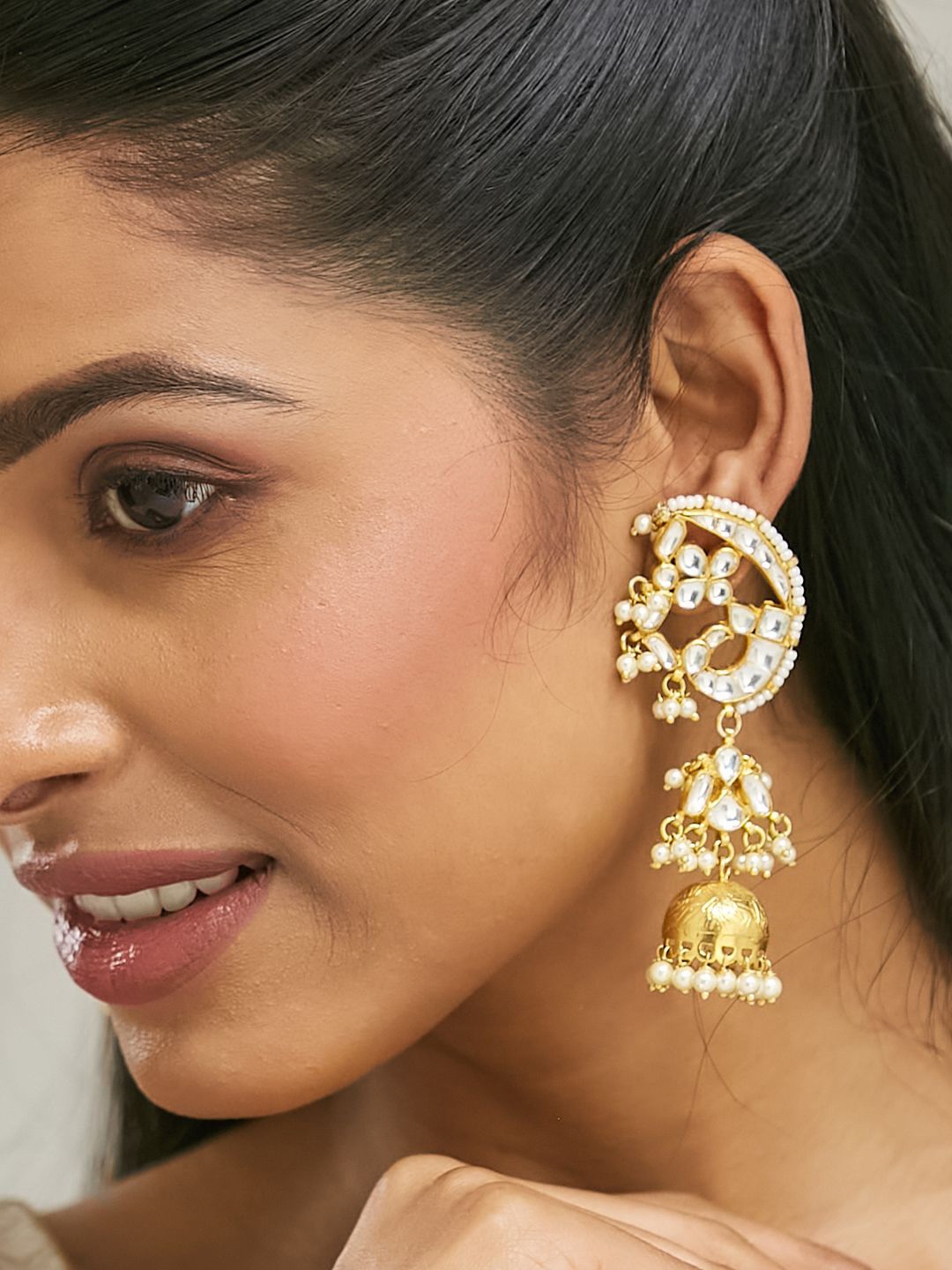 

Yinara Elegant Gold-Plated Kundan Stone Studded & Pearls Beaded Dome Shaped Jhumkas