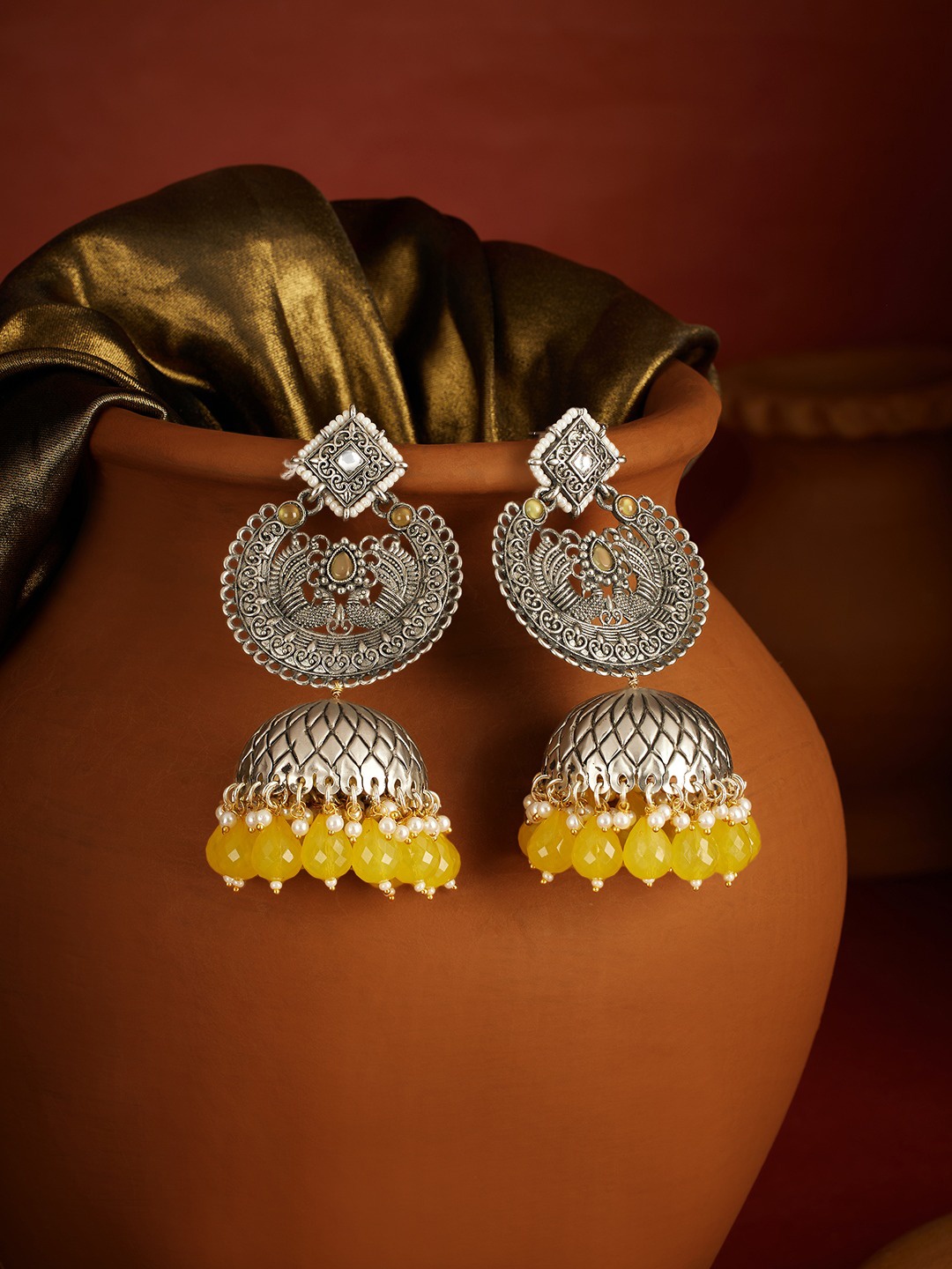 

Zaveri Pearls Silver-Plated Dome Shaped Stone Studded & Beads Two Tone Antique Jhumkas