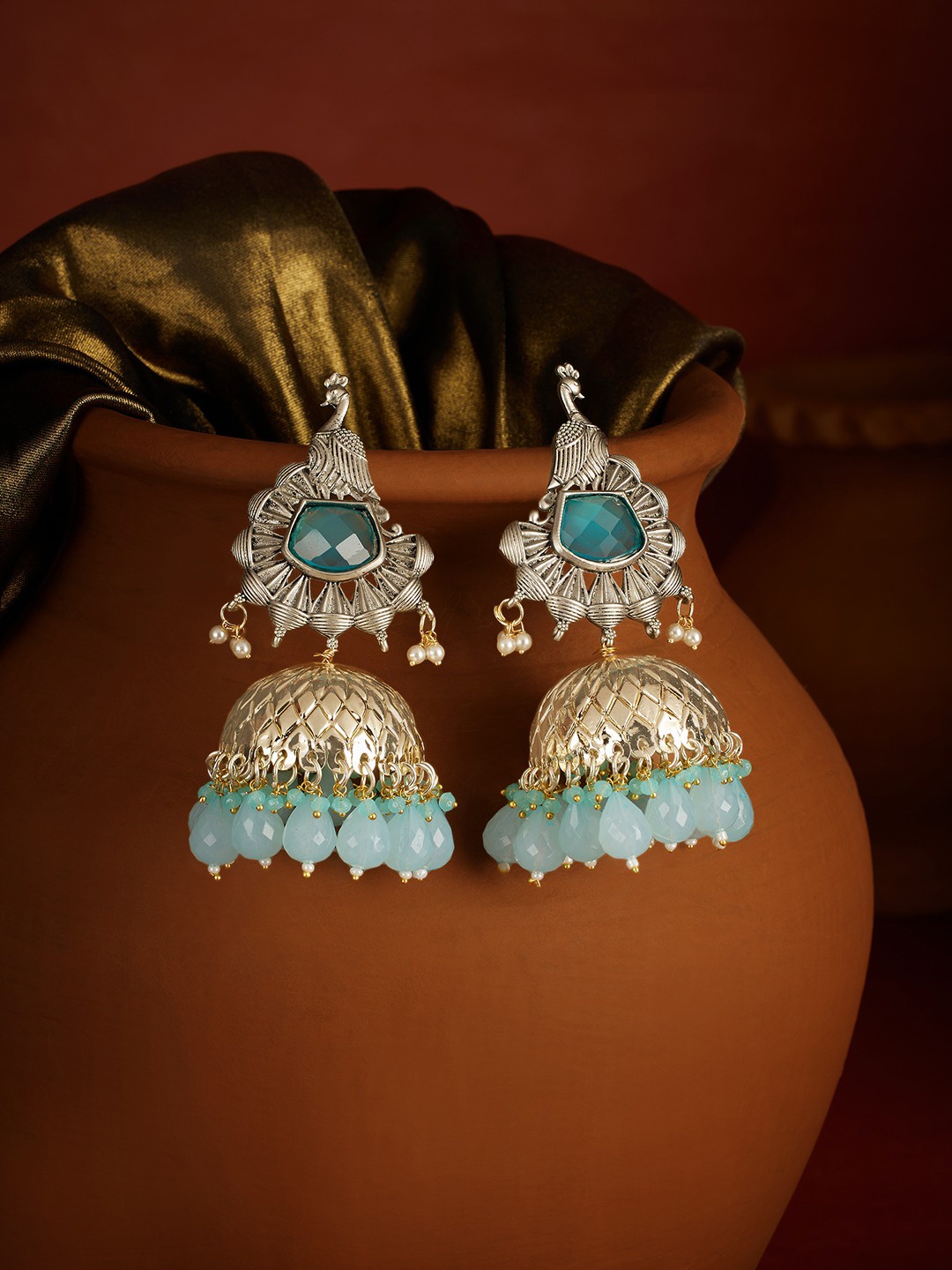 

Zaveri Pearls Silver-Plated Dome Shaped Stone Studded & Beaded Two Tone Statement Jhumkas