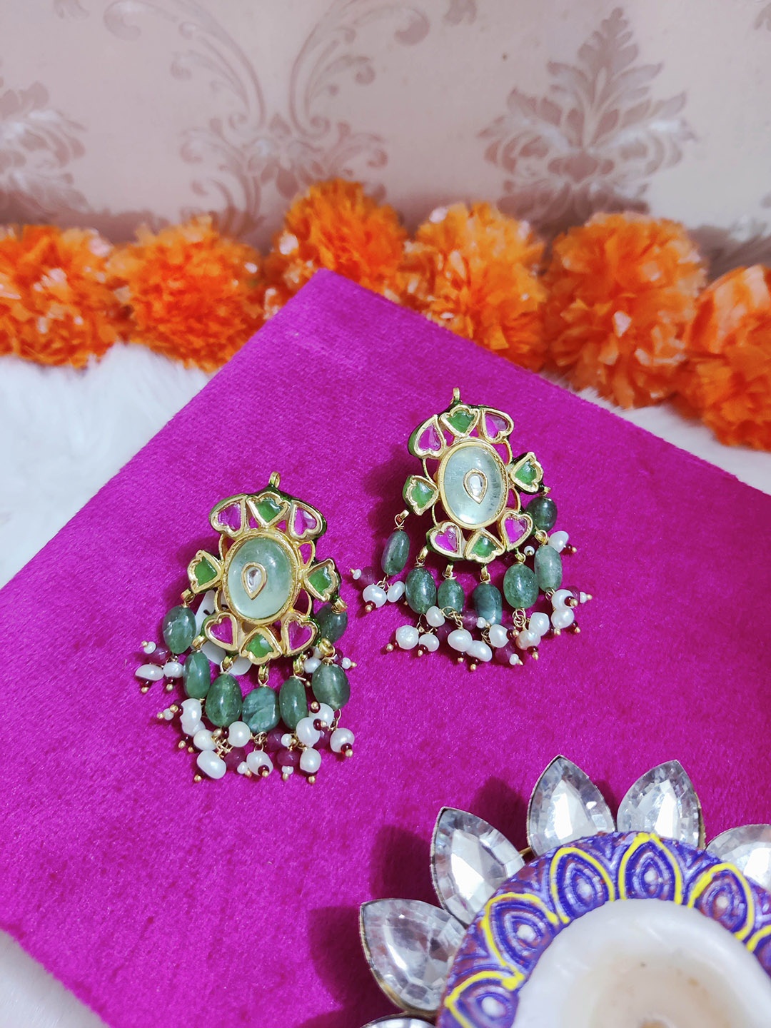 

STYLE DECO Gold Plated Kundan Studded Contemporary Studs Earrings