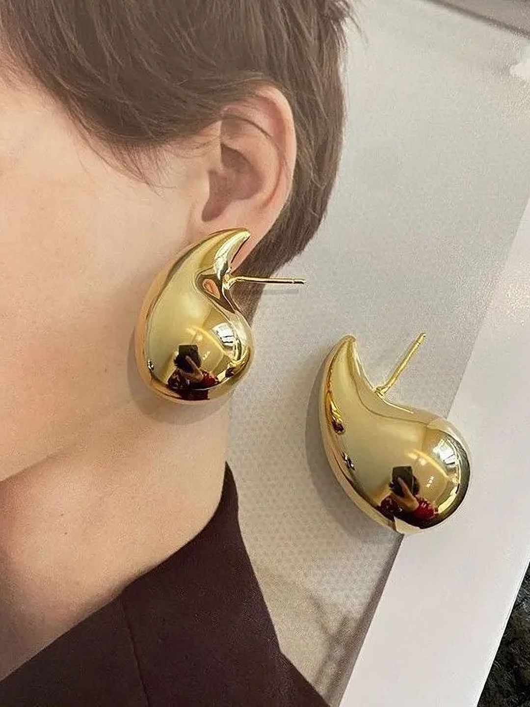 

Celestique Gold-Plated Teardrop Shaped Studs