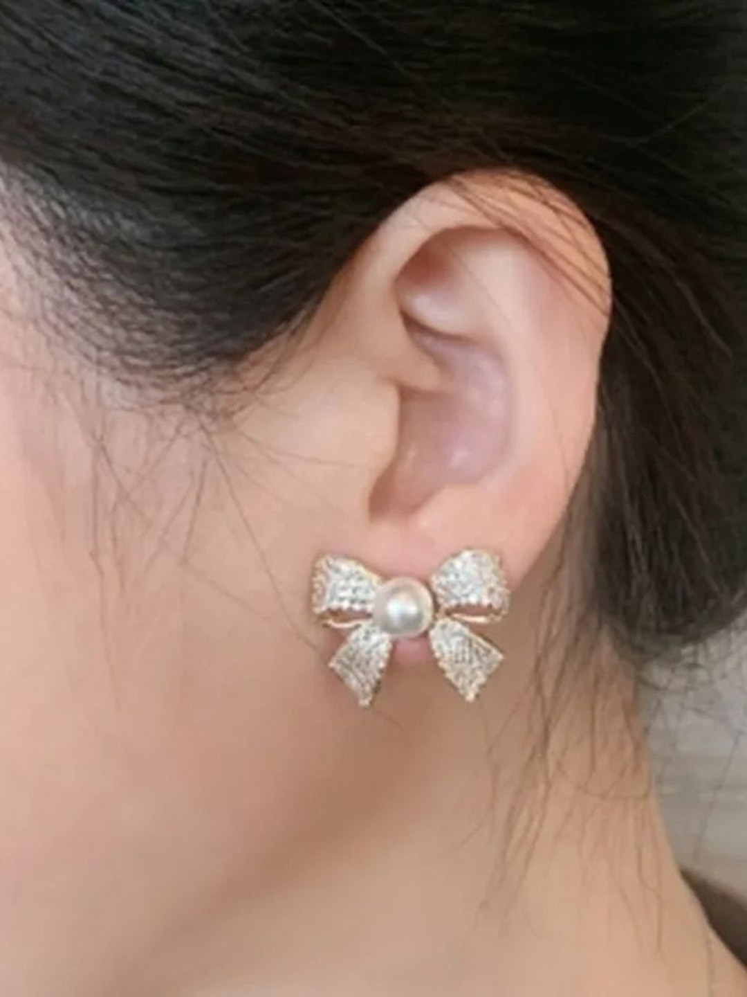 

Celestique Gold-Plated Zircon Studded Bow Shaped Studs