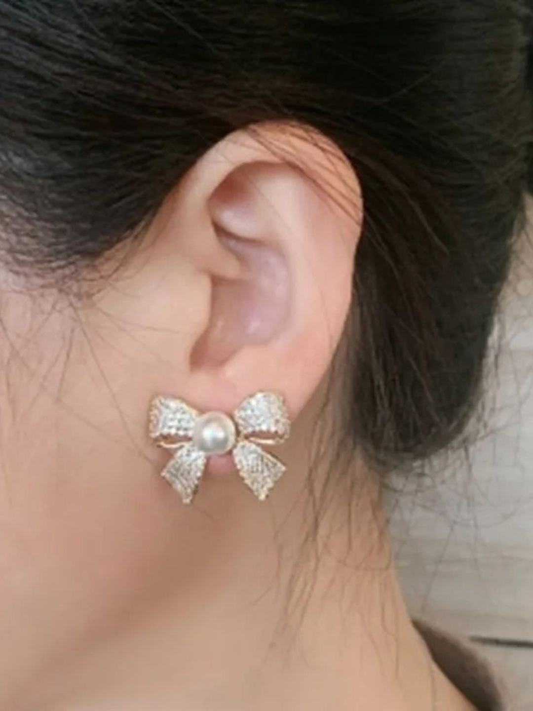 

Celestique Gold Plated Pearls Studded Contemporary Studs Earrings