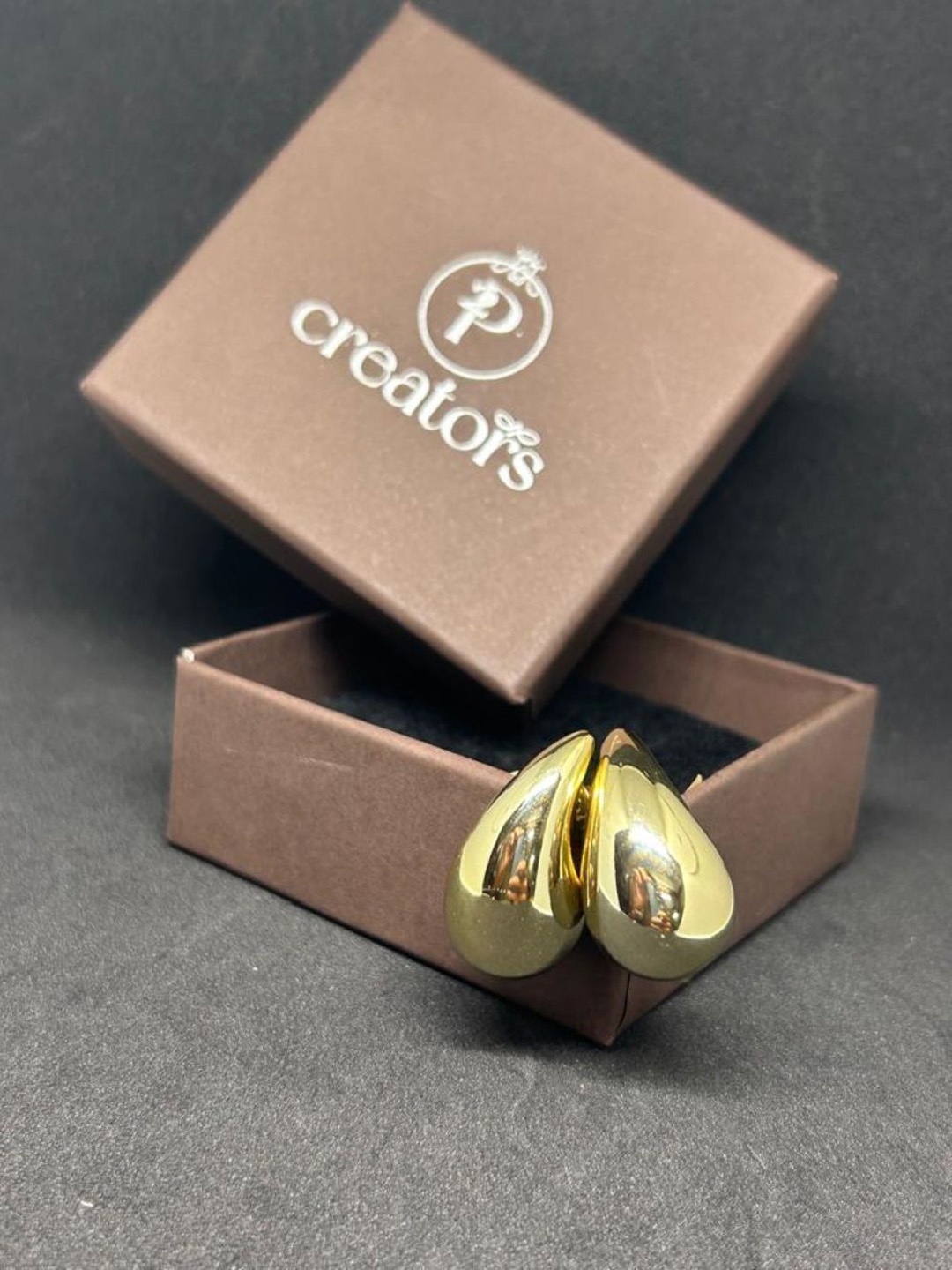 

Celestique Gold-Plated Teardrop Shaped Studs