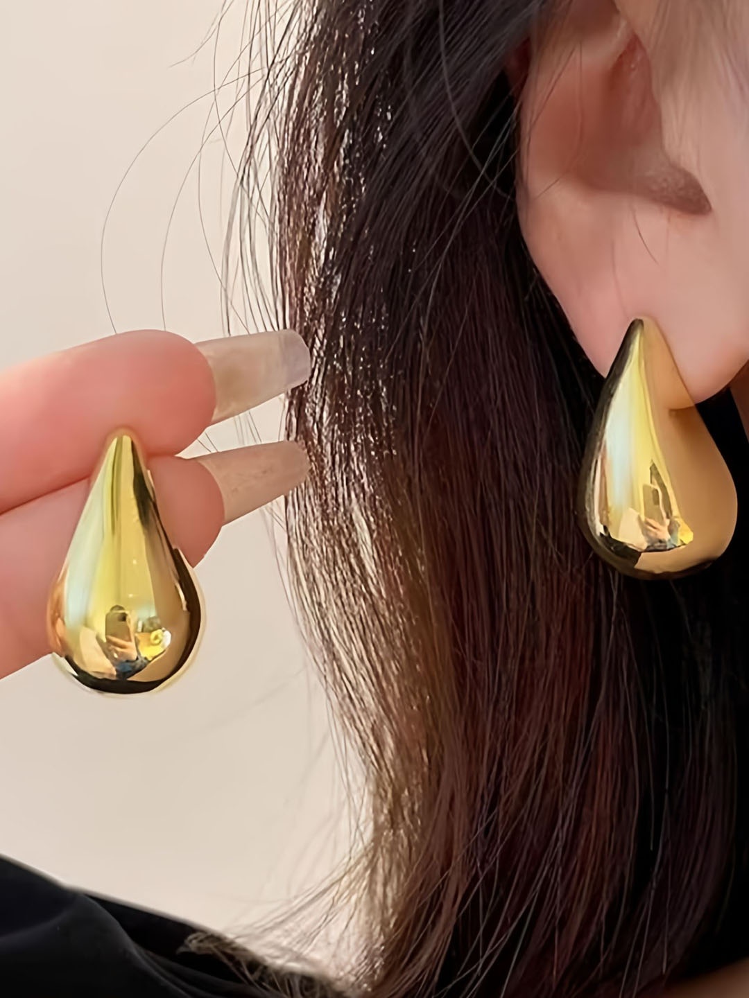 

Celestique Gold-Plated Teardrop Shaped Studs