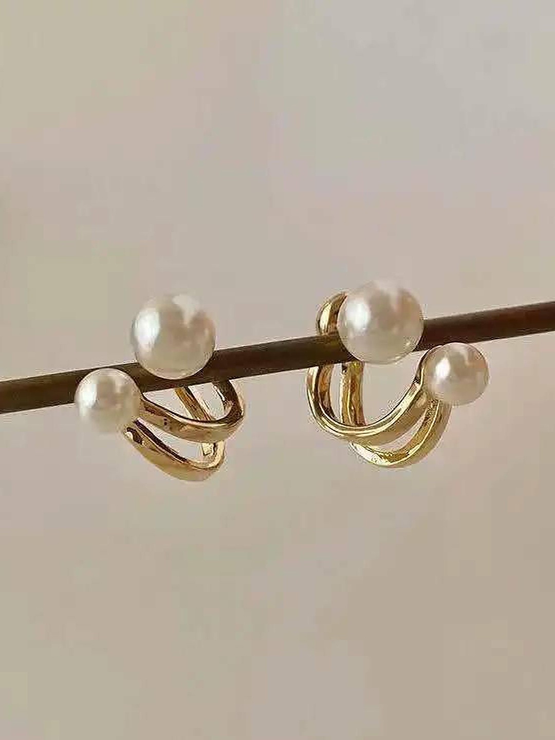 

Celestique Gold Plated Pearls Contemporary Studs