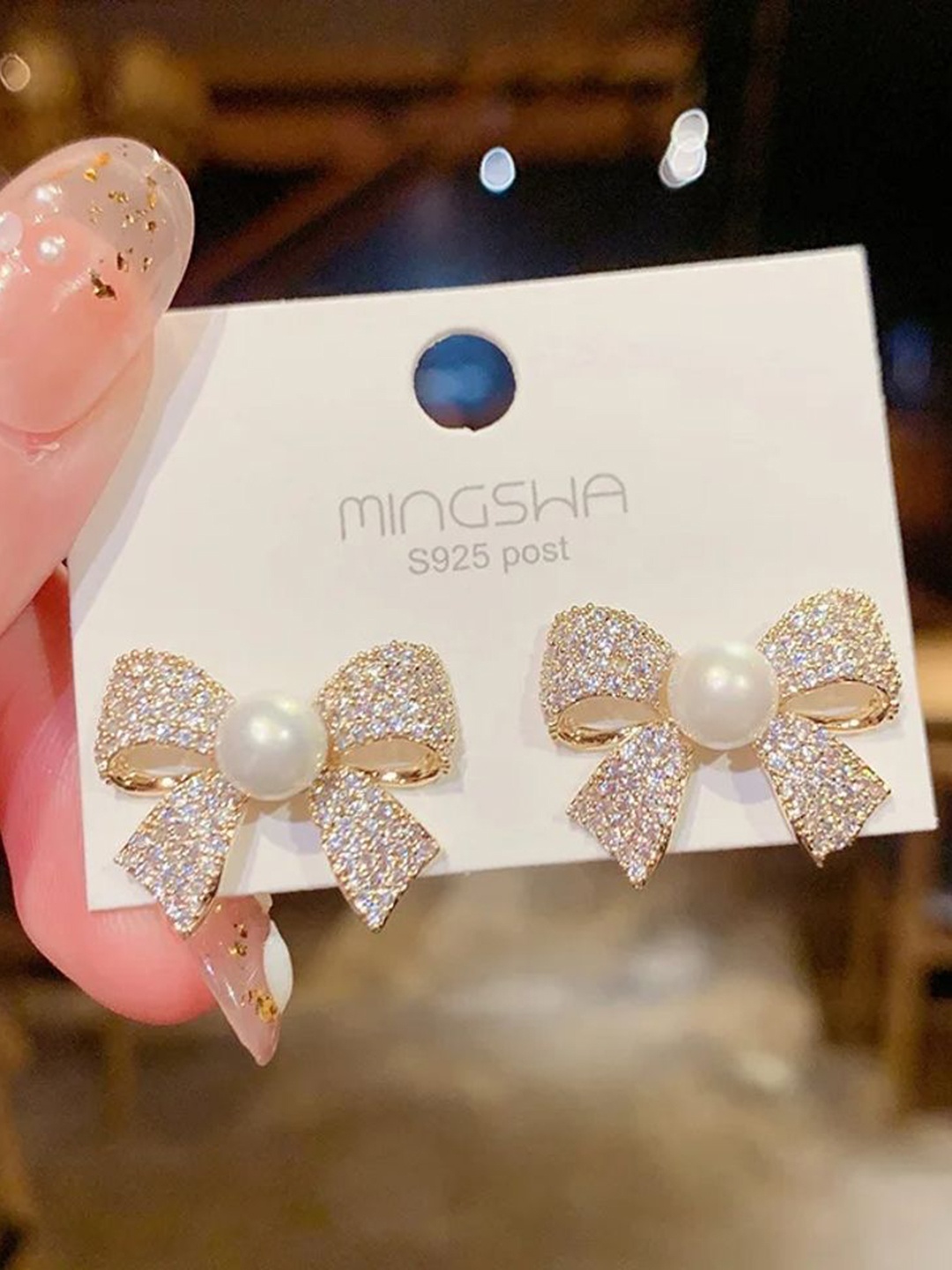 

Celestique Gold-Plated Zircon Studded Contemporary Studs Earrings