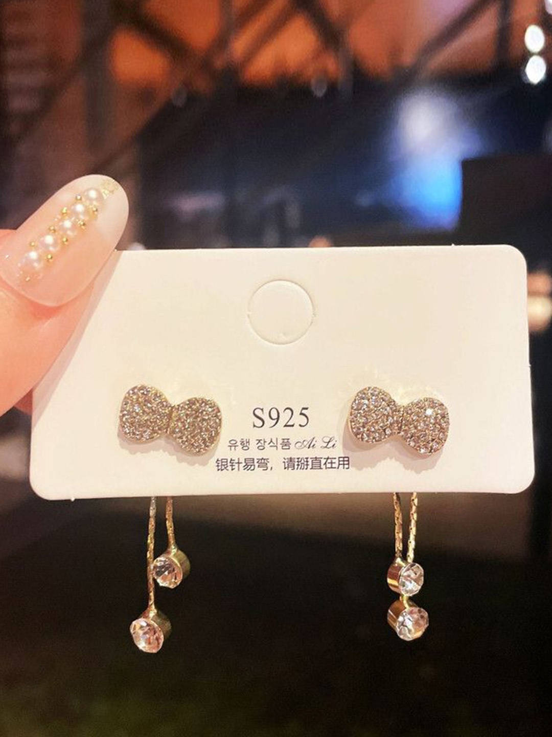 

Celestique Gold-Plated Stone Studded Contemporary Studs