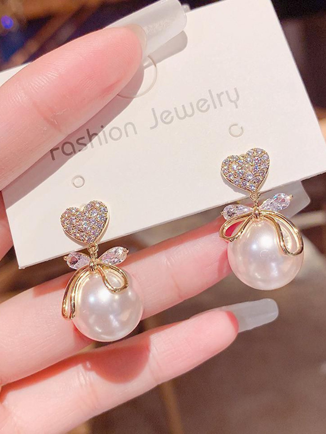 

Celestique Stone Studded Contemporary Studs Earrings, Gold