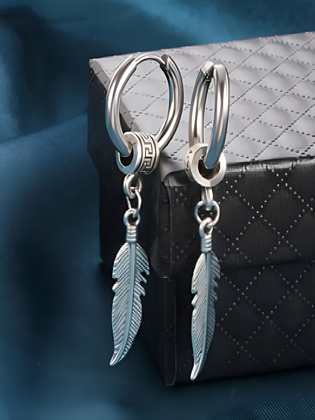 

RUHI COLLECTION Silver Plated Feather Shaped Hoop Earrings