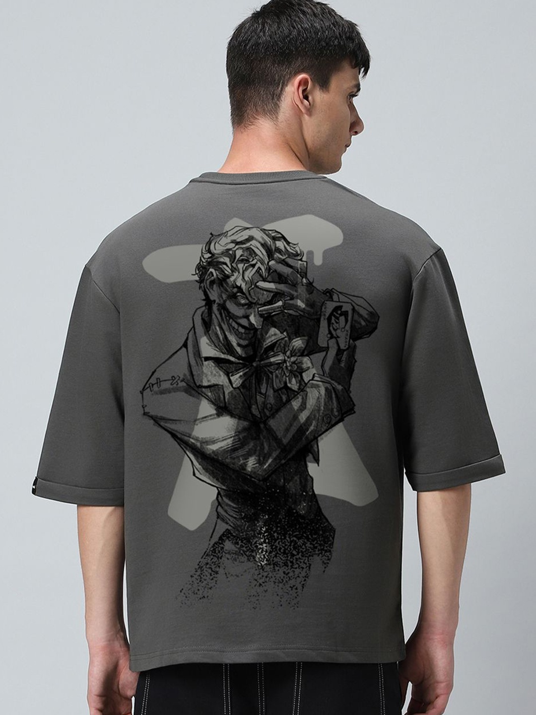 

Bewakoof Men Graphic Printed Round Neck Cotton Oversized T-shirt, Charcoal