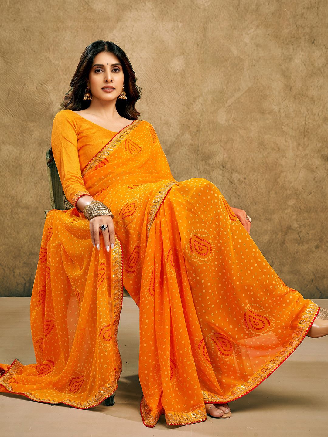

Mitera Pure Georgette Bandhani Saree, Yellow