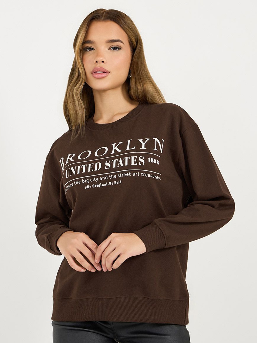 

Styli Women Regular Fit Regular Length Slogan Sweatshirt, Brown