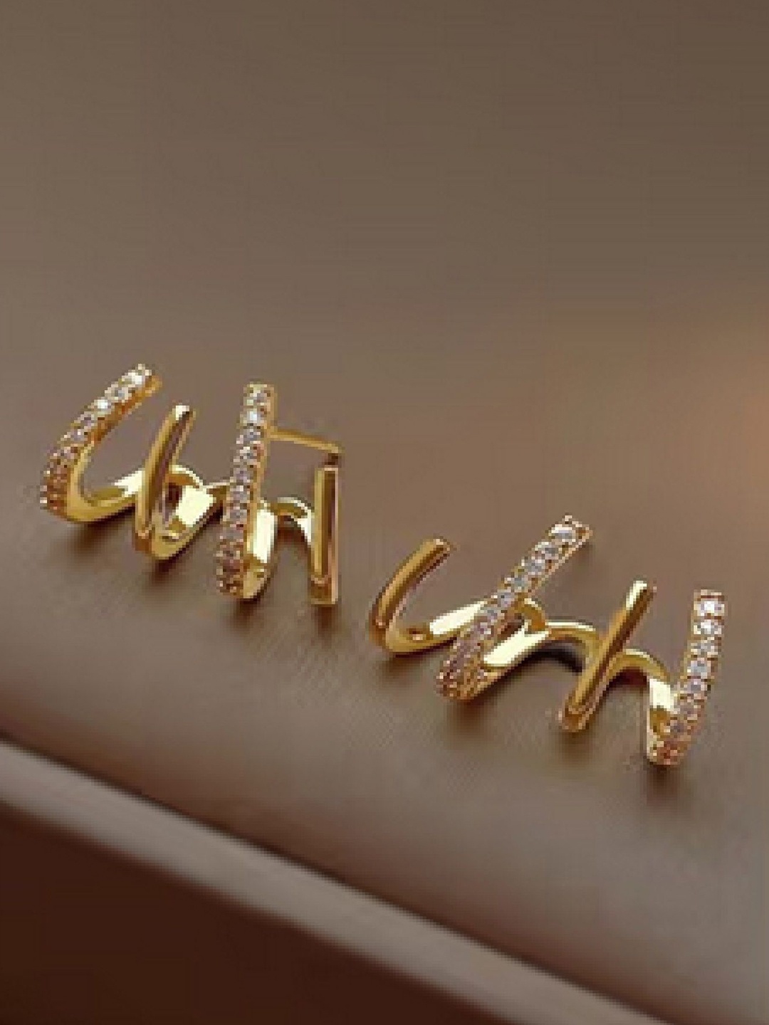 

RUHI COLLECTION Gold Plated Crystals Studded Geometric Claw Hoop Earrings