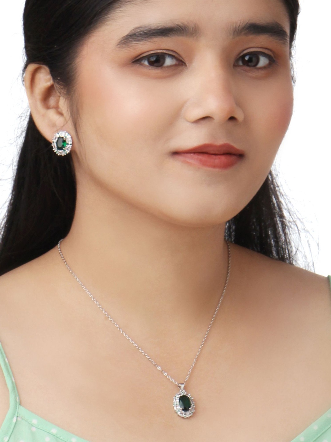 

Kord Store Rhodium Plated American Diamond Studded Pendant and Earrings, Silver
