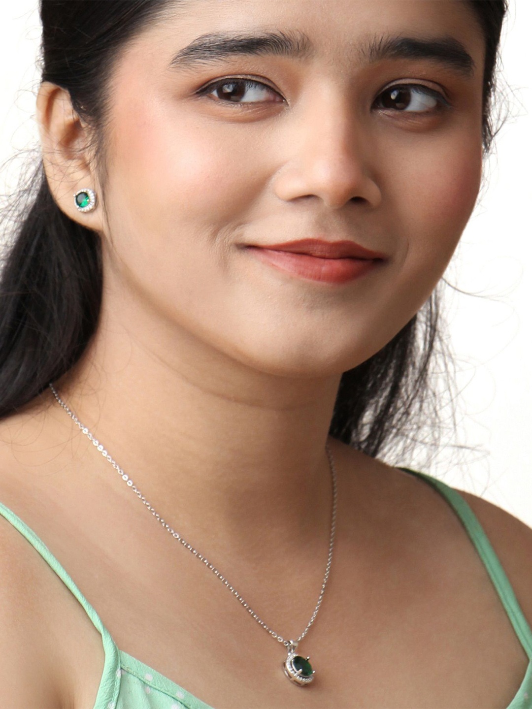 

Kord Store Rhodium-Plated American Diamond Studded Pendant and Earrings, Silver