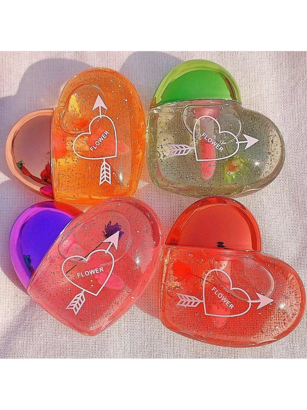 

NANCY AJRAM Set Of 4 Heart Shaped Lip Gloss - 20 gm Each, Pink
