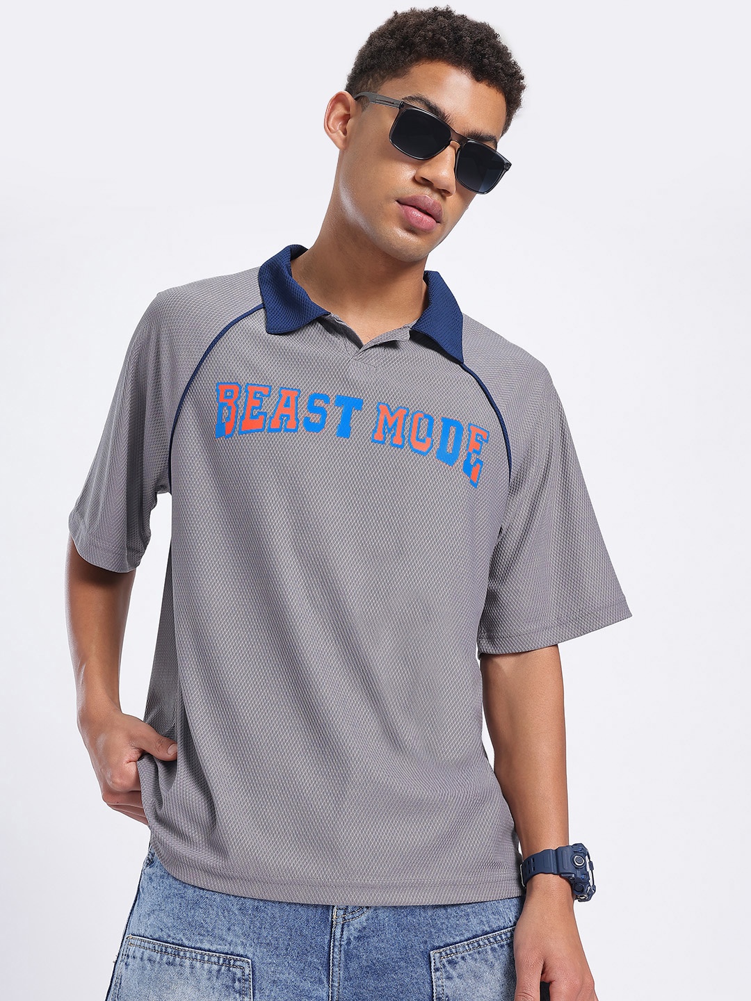 

glitchez Bold Text Print Geometric Self-Design Regular Fit Polo Collar T-shirt, Grey
