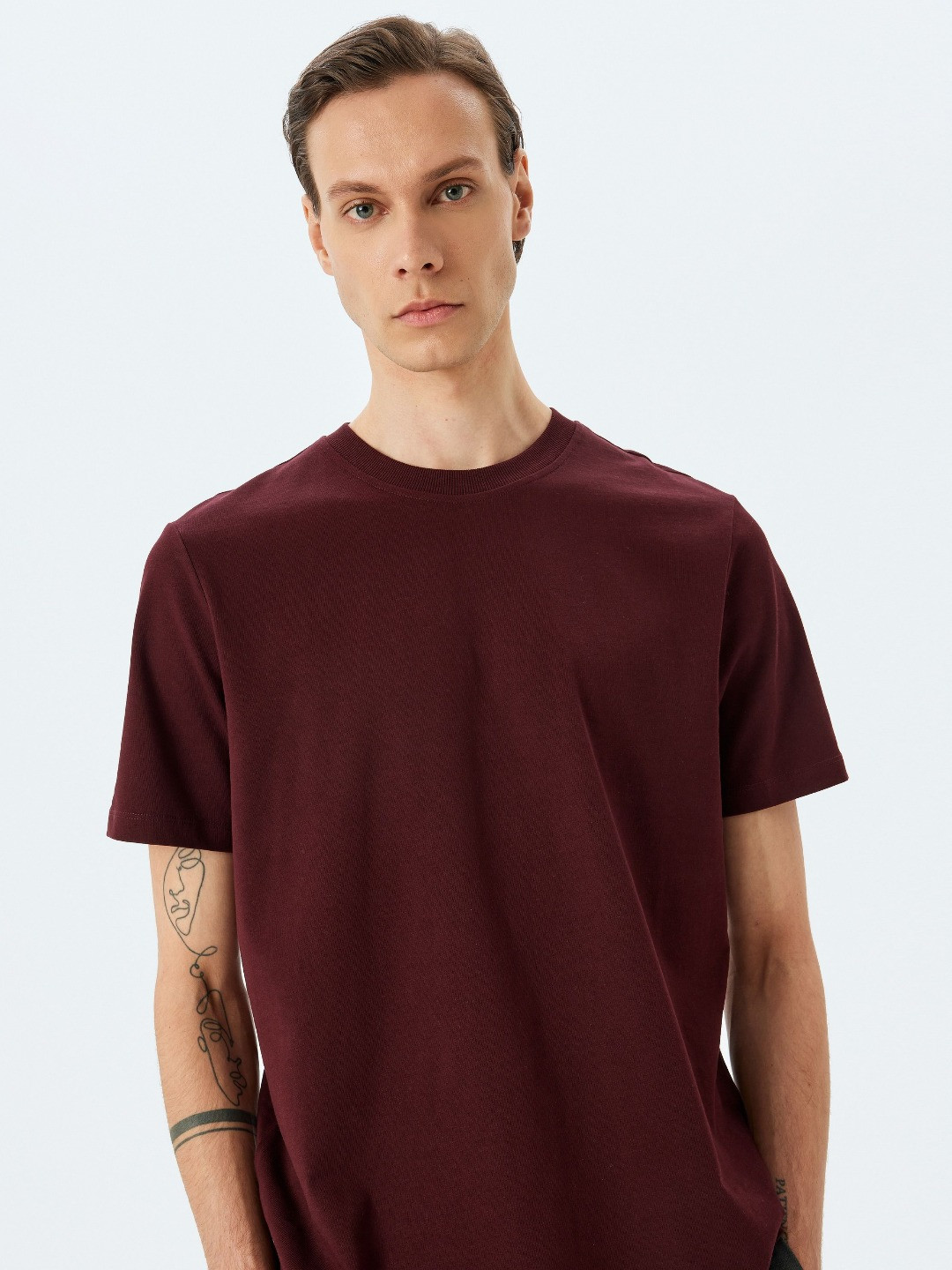 

Koton Men Solid Round Neck Cotton T-shirt, Maroon