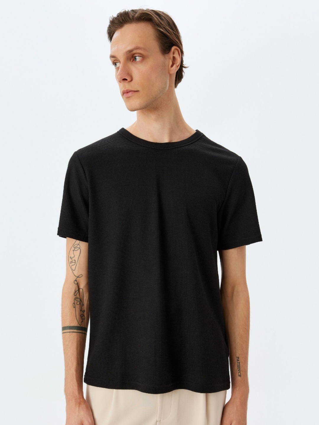 

Koton Men Solid Round Neck T-shirt, Black