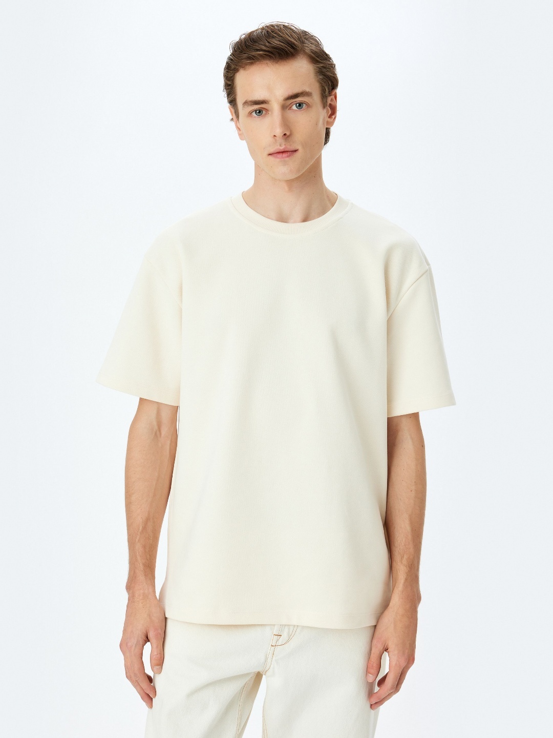

Koton Men Solid Round Neck Cotton Relaxed Fit T-shirt, Cream