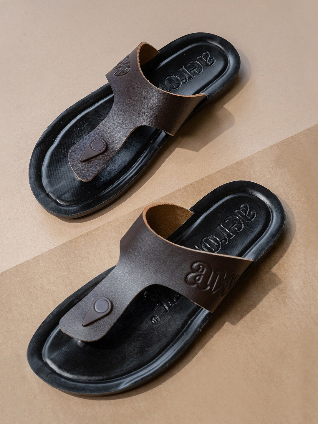 

Aerowalk Men Solid Slip-On Flip Flops, Brown