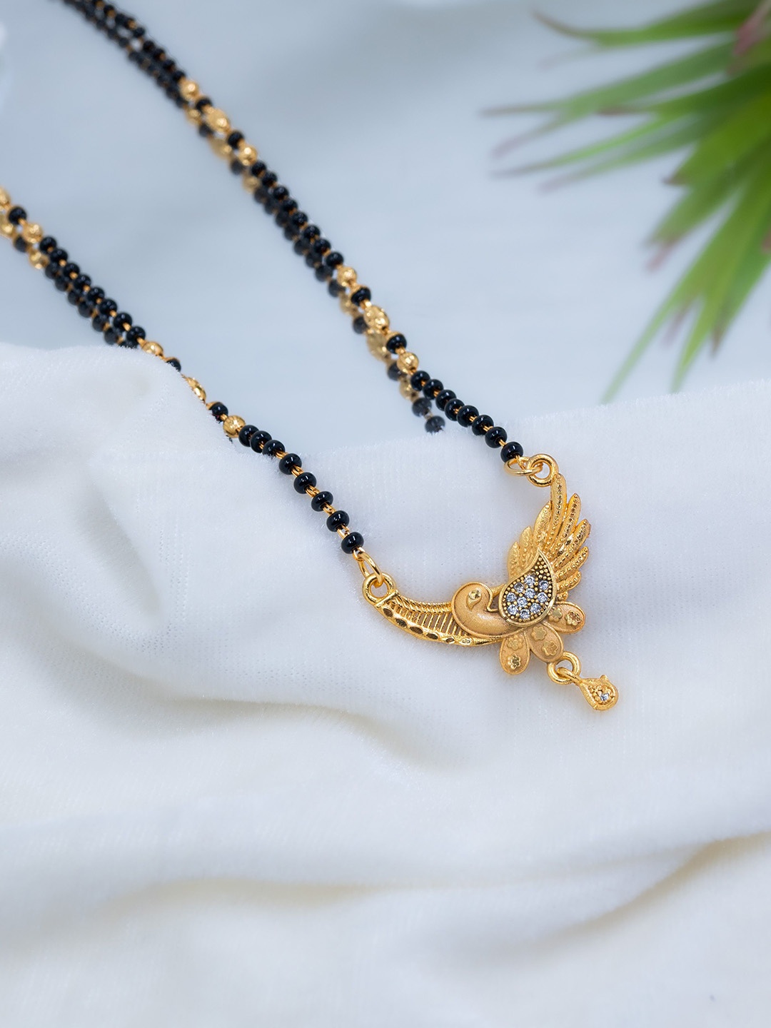 

GOLD CASH Gold-Plated Stone Studded and Beaded Peacock Design Mangalsutra