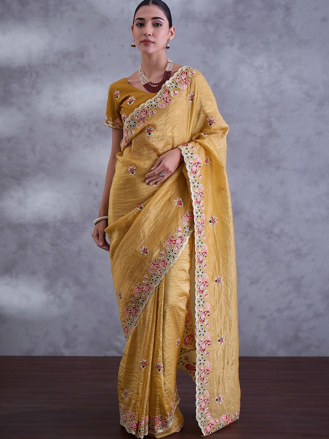 

Saree mall Women Embroidered Tissue Sarees, Mustard