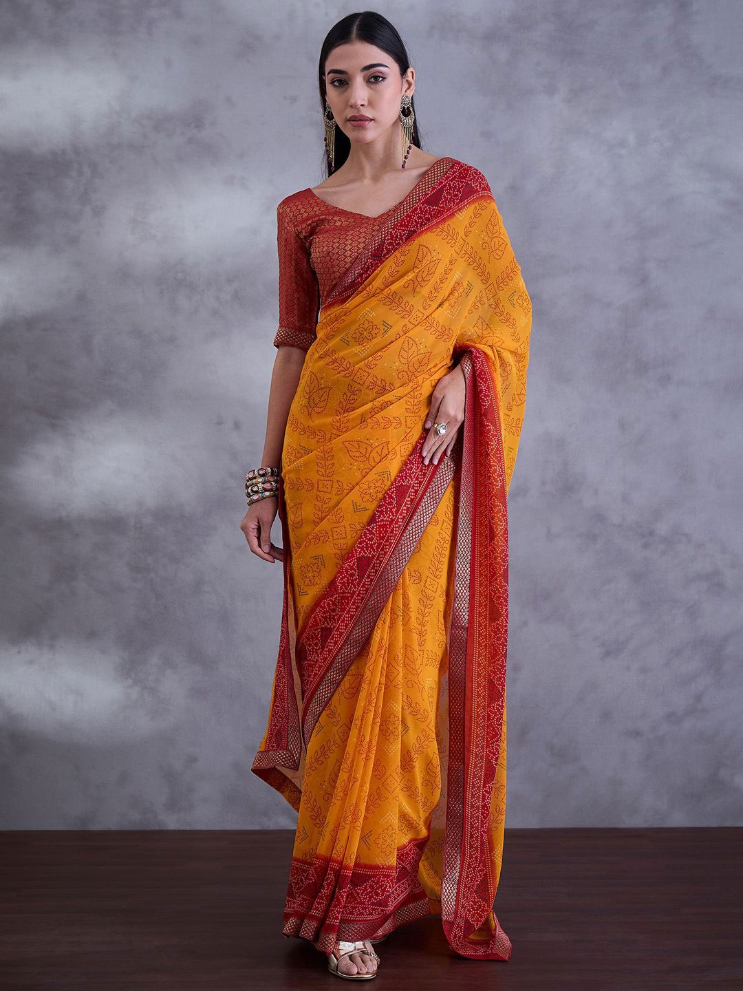 

Saree mall Bandhani Printed Embellished Beads and Stones Sarees, Yellow