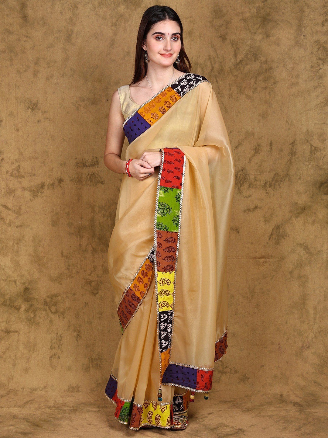 

Exotic India Patch Border Saree Handcrafted by Adivasi Women of Madhya Pradesh, Brown