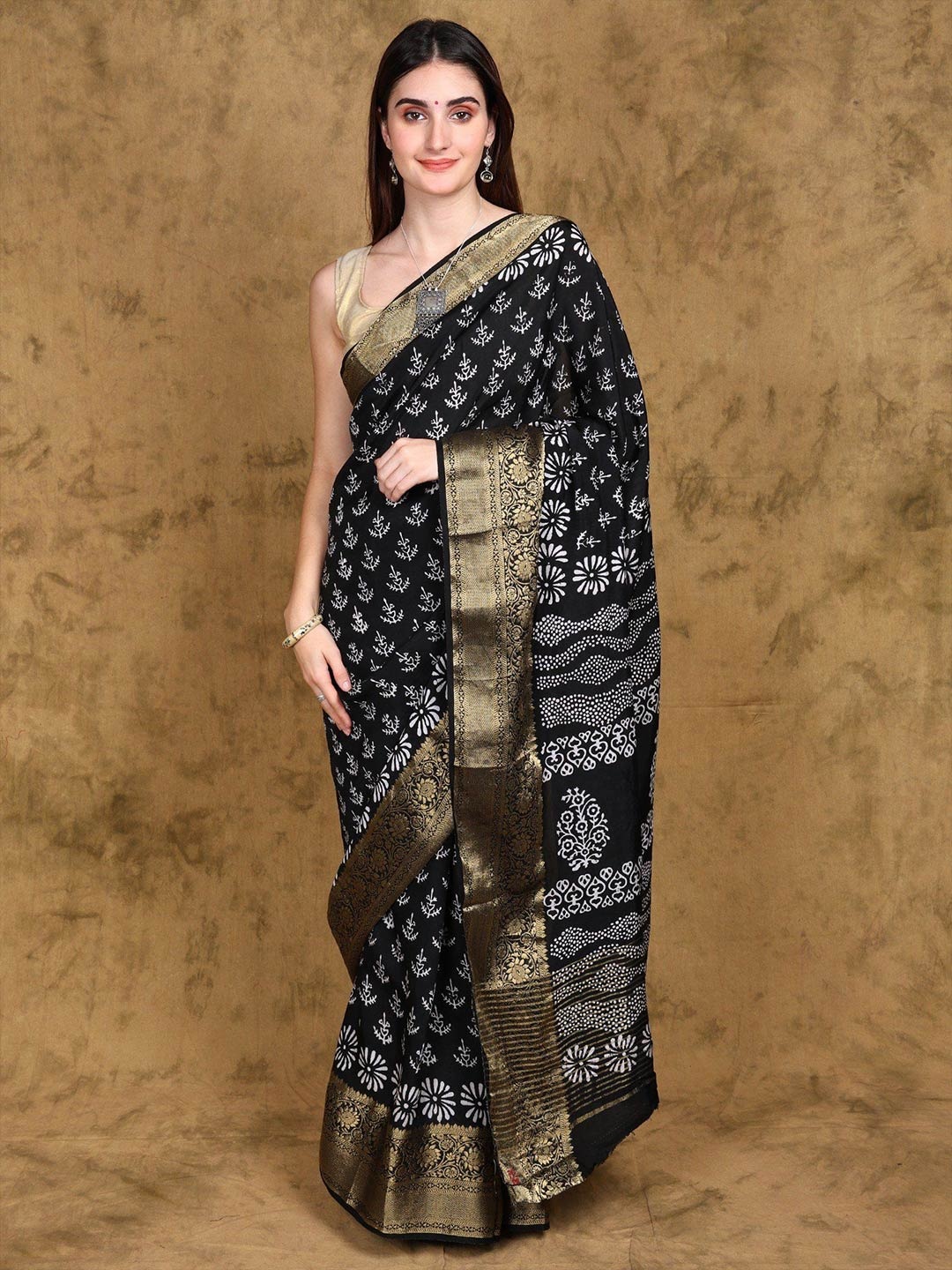 

Exotic India Black Dabu Hand Block Printed Dola Silk Saree with Zari Woven Floral Border