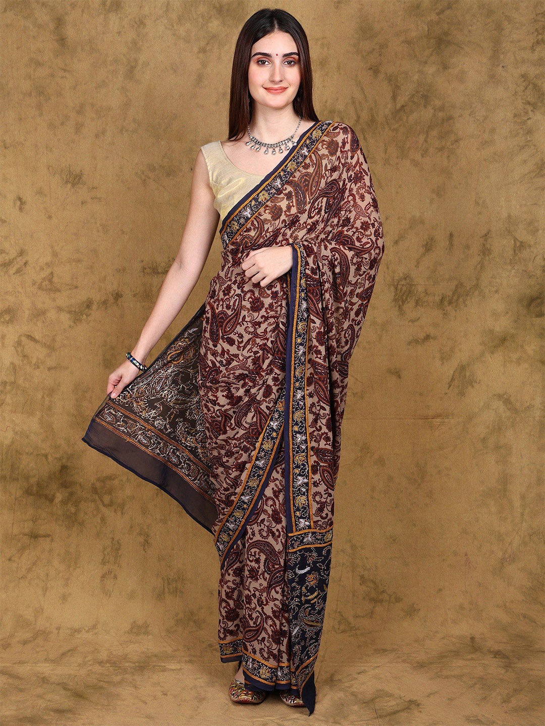 

Exotic India Paisley Printed Georgette Saree with Kantha Embroidered Border and Pallu, Maroon