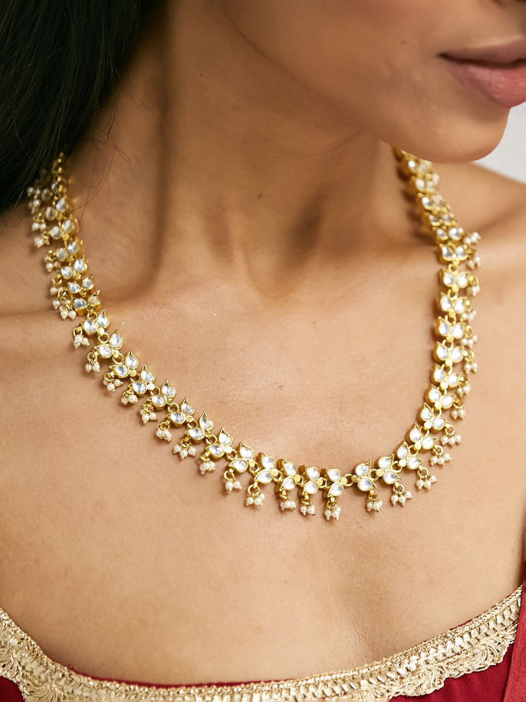 

Yinara Gold-Plated Crystal & Pearls Studded Matha Patti Head Jewellery