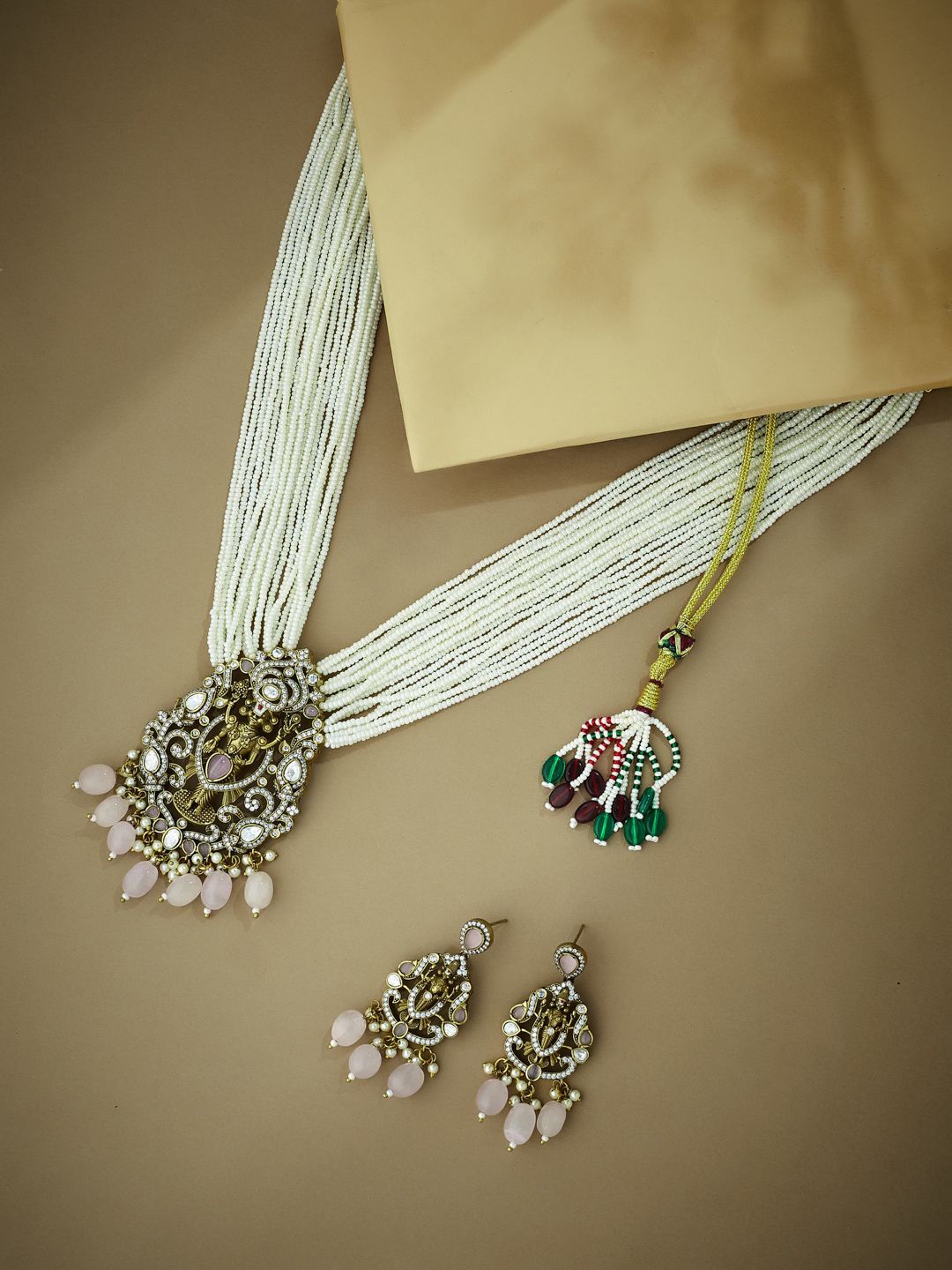 

Yinara Gold-Plated Cubic Zirconia Studded & Beaded Venkateshwara Goddess Jewellery Set