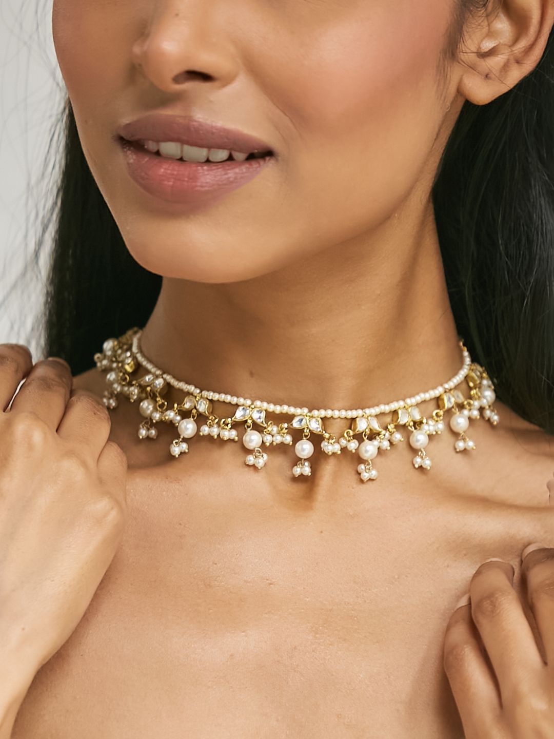 

Yinara Gold-Plated Crystal & Pearls Studded Matha Patti Head Jewellery