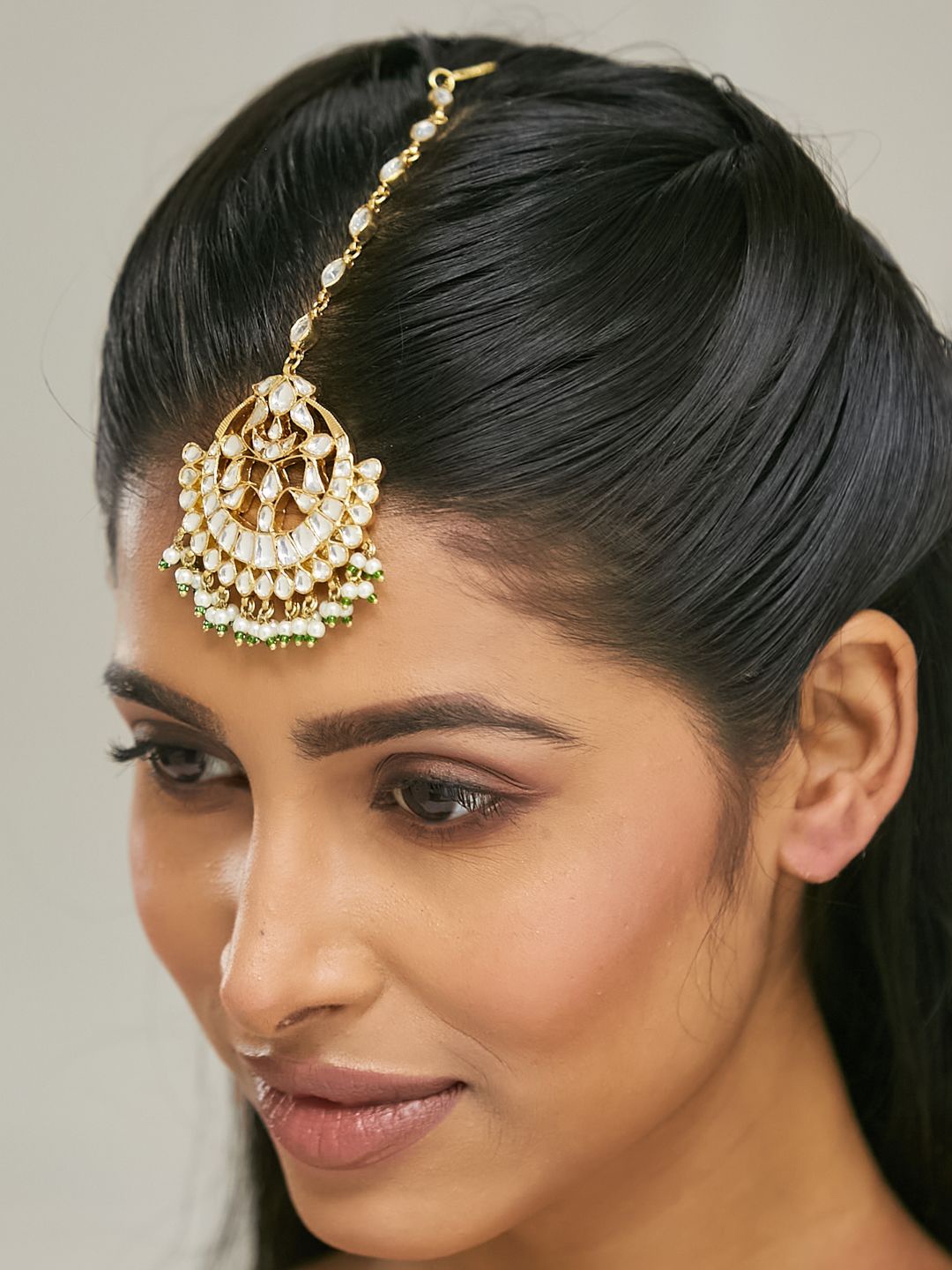 

Yinara Gold-Plated Pearls & Kundan Studded Maang Tikka Head Jewellery