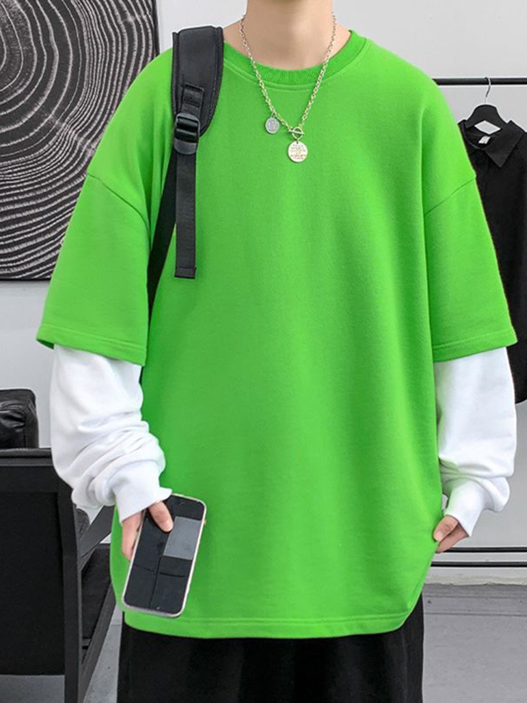 

StyleCast x Revolte Men Solid Round Neck Cotton Oversized T-shirt, Green