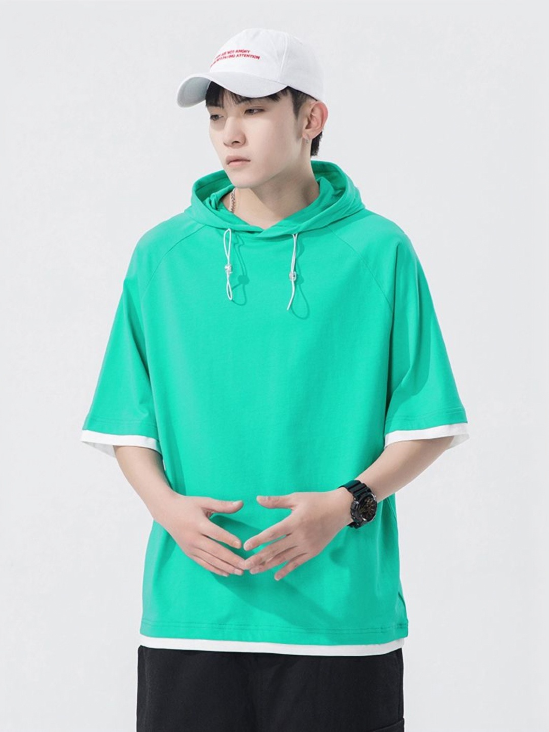 

StyleCast x Revolte Men Solid Hood Oversized Cotton T-shirt, Turquoise blue