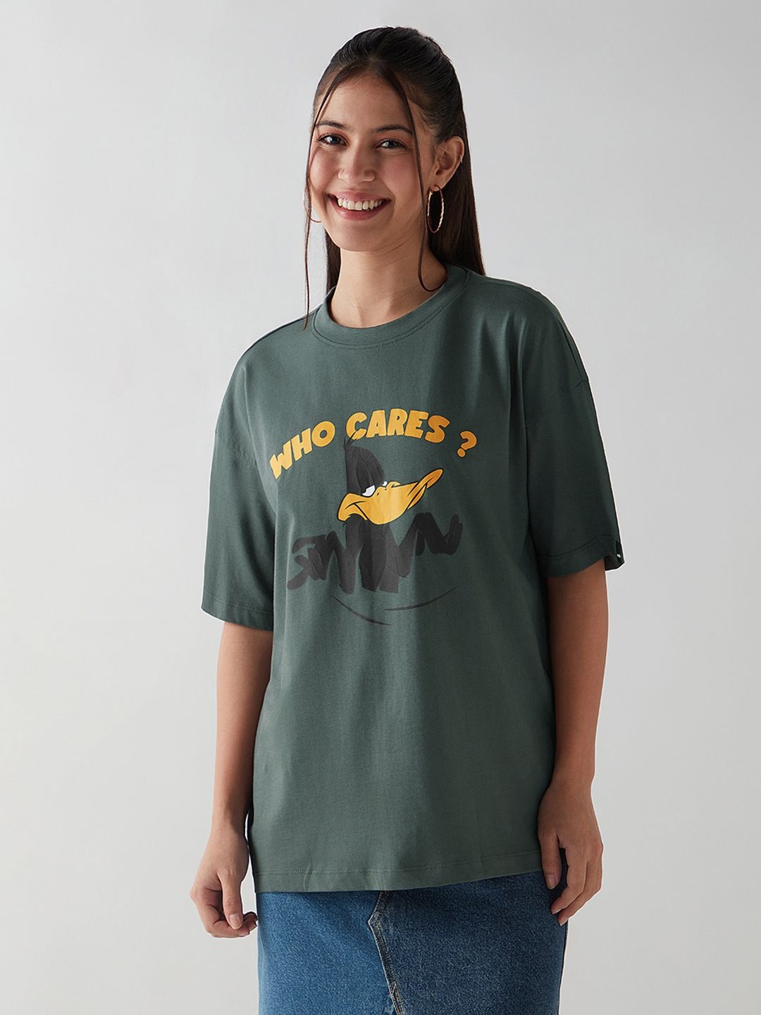 

Bewakoof Women Looney Tunes Graphic Printed Round Neck Pure Cotton Oversized T-shirt, Green