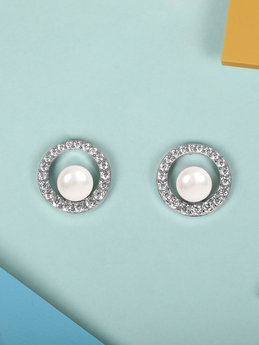 

Mia by Tanishq Luminous 93 Kt Silver-Plated Circular Oxidised Cubic Zirconia Pearl Studs