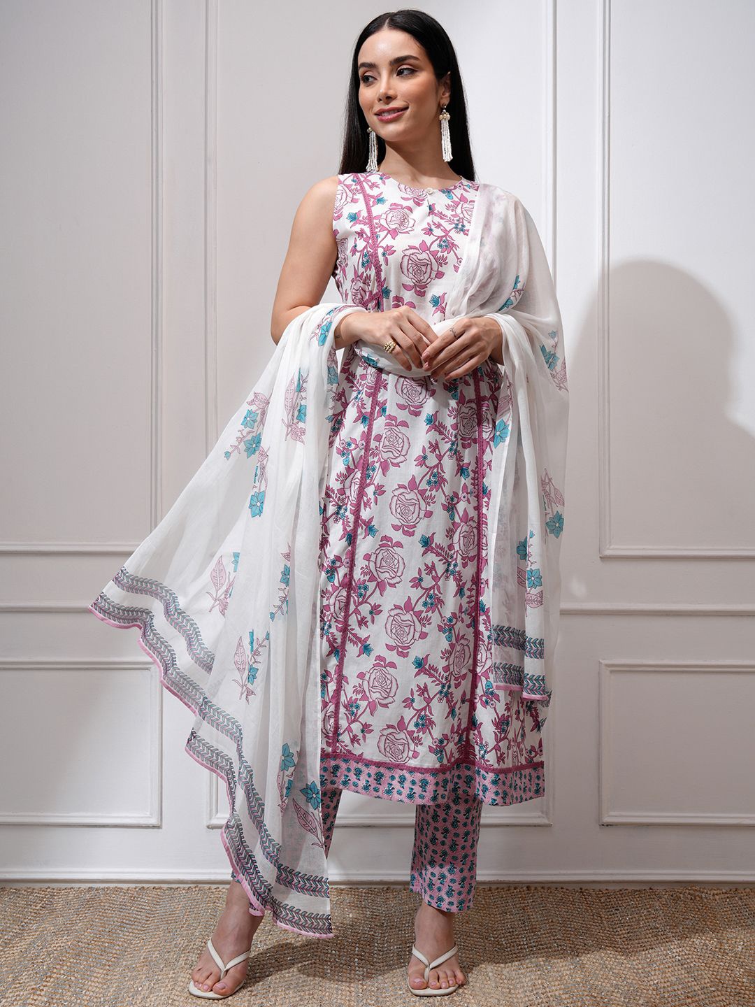 

Vishudh Floral Printed Keyhole Neck Sleeveless A-Line Kurta with Trousers & With Dupatta, Mauve