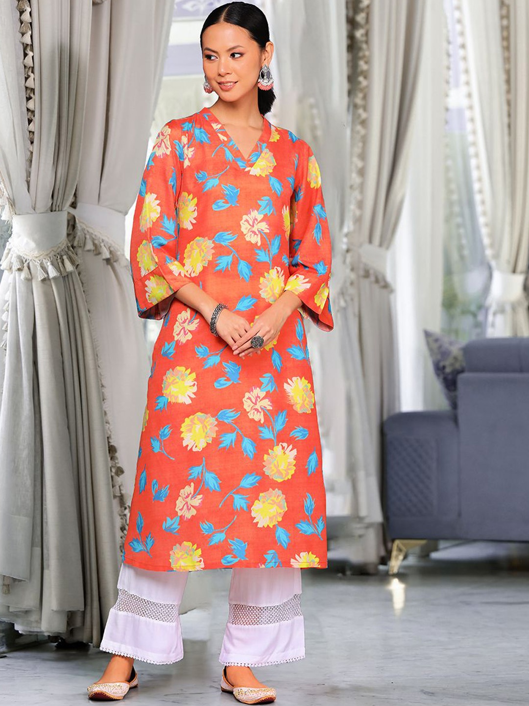 

Varanga Orange Floral Printed V-neck Three-Quarter Flared Sleeves A-Line Kurta