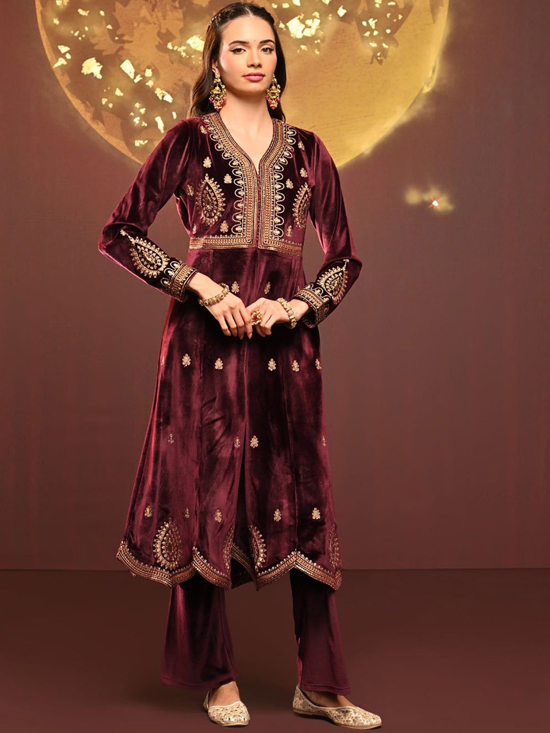 

Lakshita Women Ethnic Motifs Embroidered Regular Velvet Kurta with Trousers, Maroon