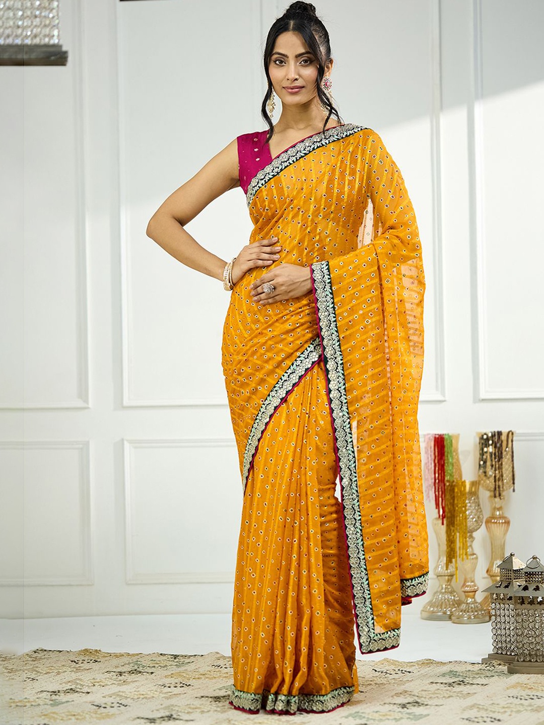 

Satrani Embroidered Pure Georgette Bandhani Saree, Yellow