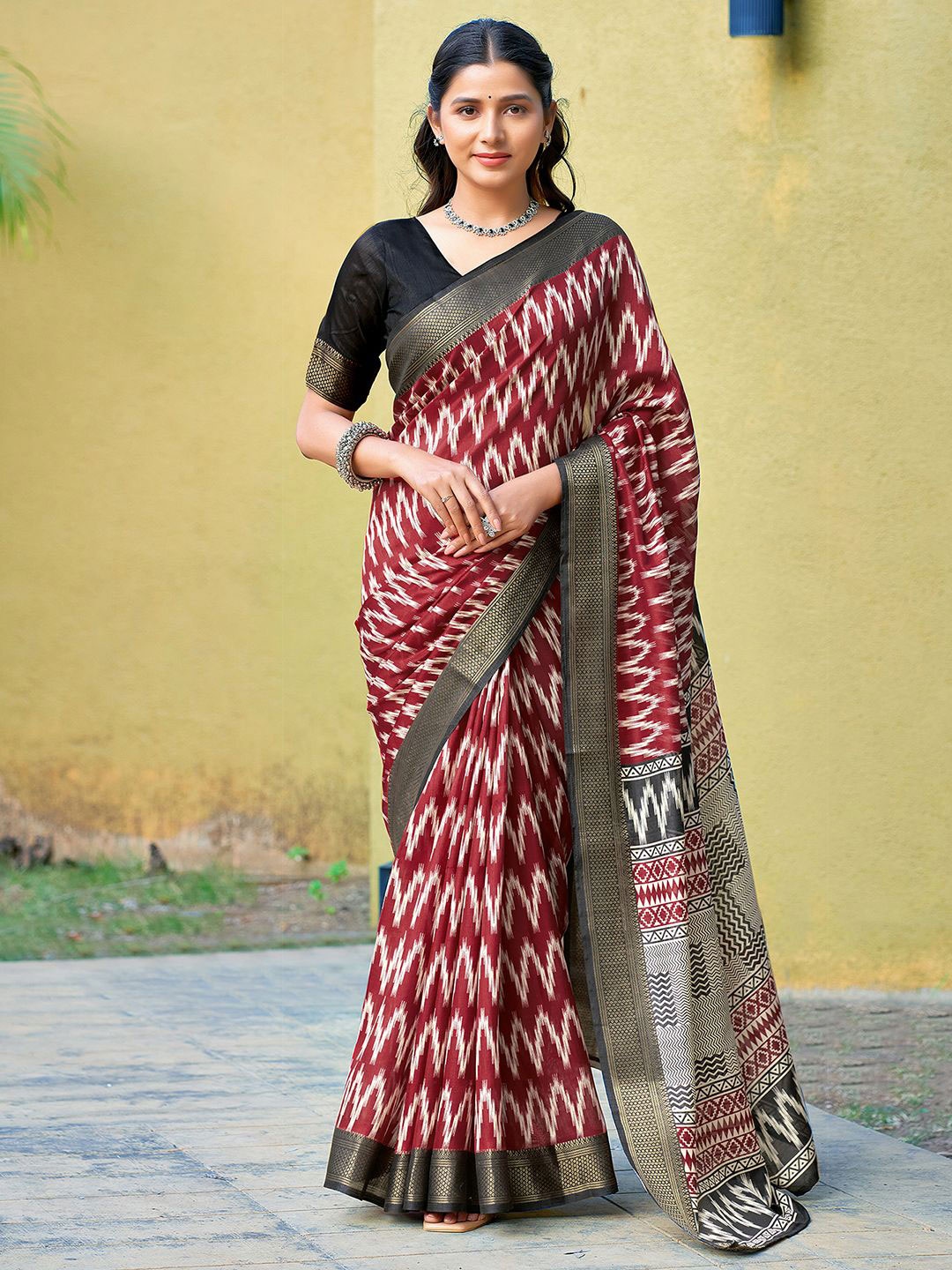 

KALINI Batik Printed Zari Saree, Maroon