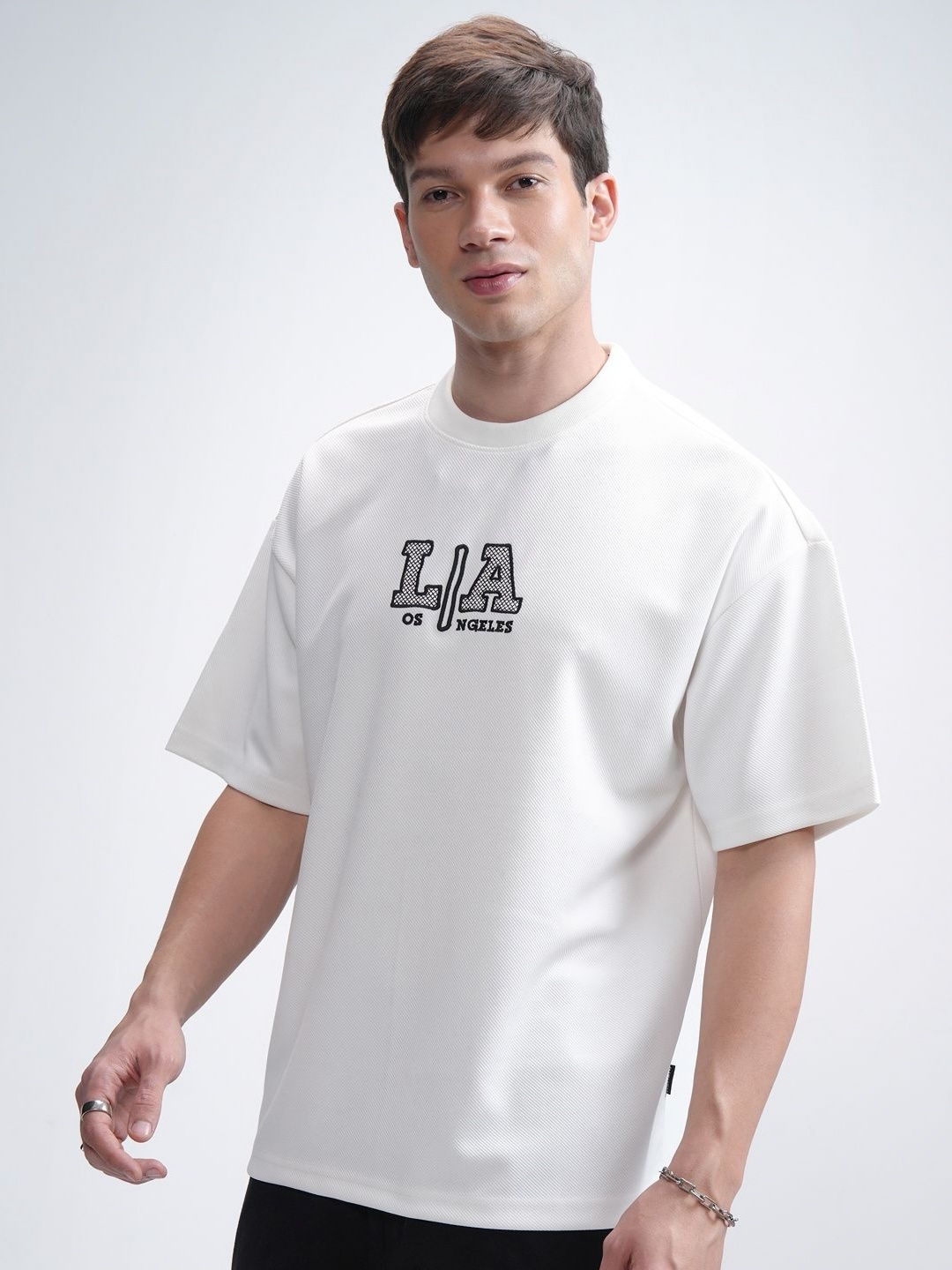

HIGHLANDER Men Round Neck Half Sleeve Oversized Embellished T- Shirt, White