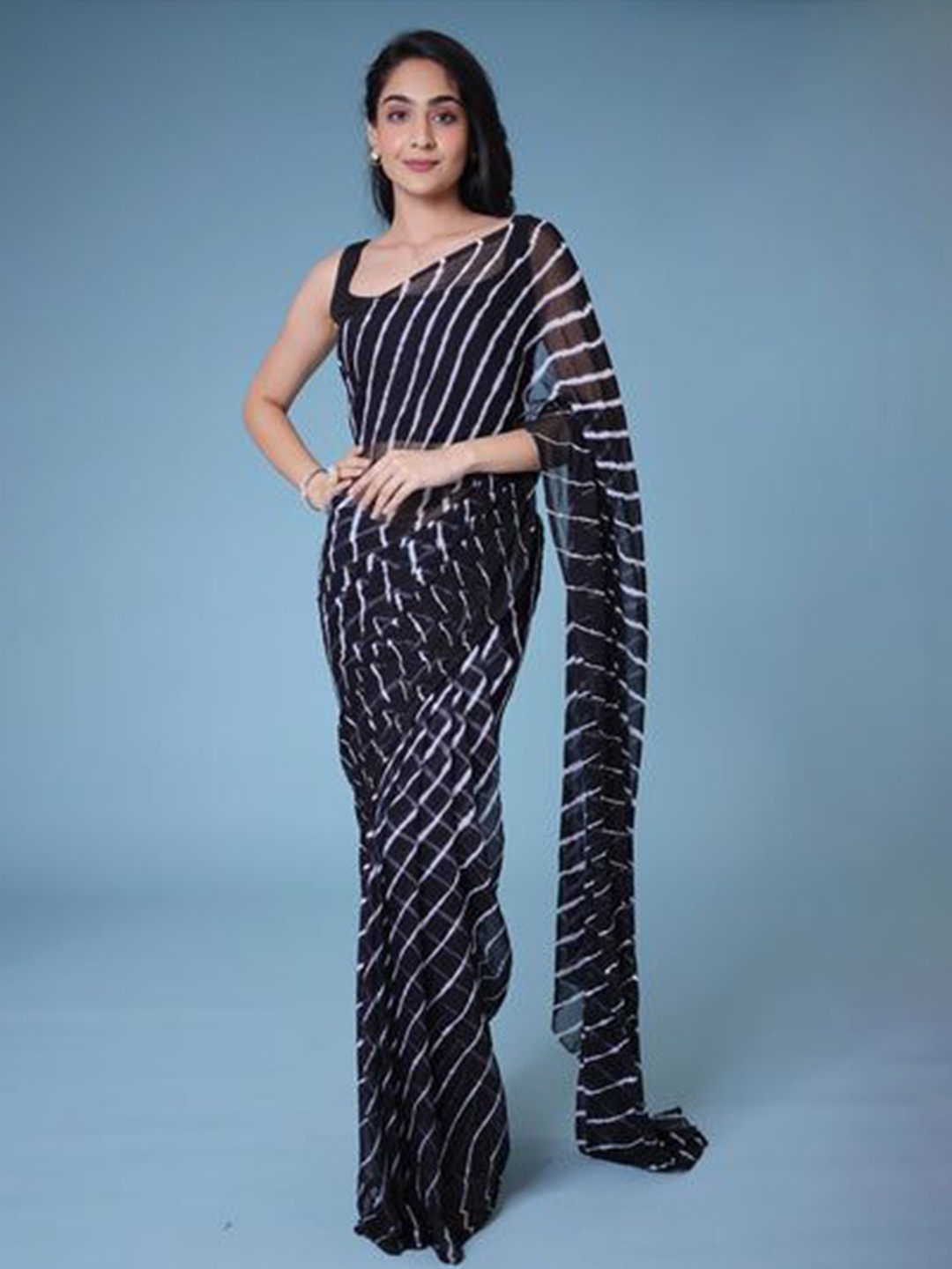 

Krimmple Striped Pure Chiffon Saree, Black