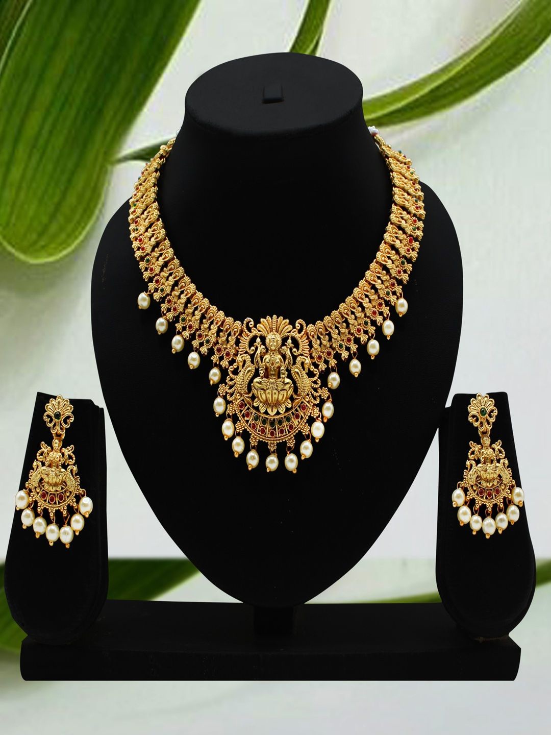 

JANAVI Gold Plated Artificial Stones Studded & Beaded Necklace With Earrings